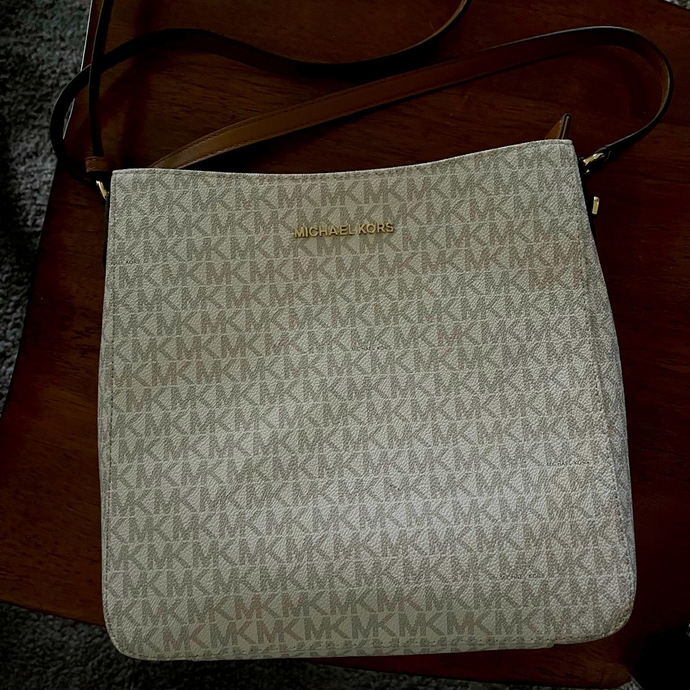 Michael Kors crossbody bag. Cream bag with rich brown trim.